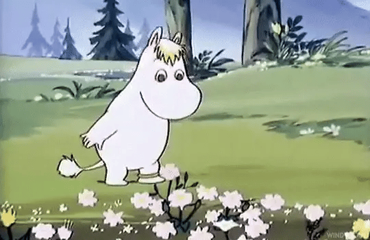 Moomin picking flowers and placing them on their head.